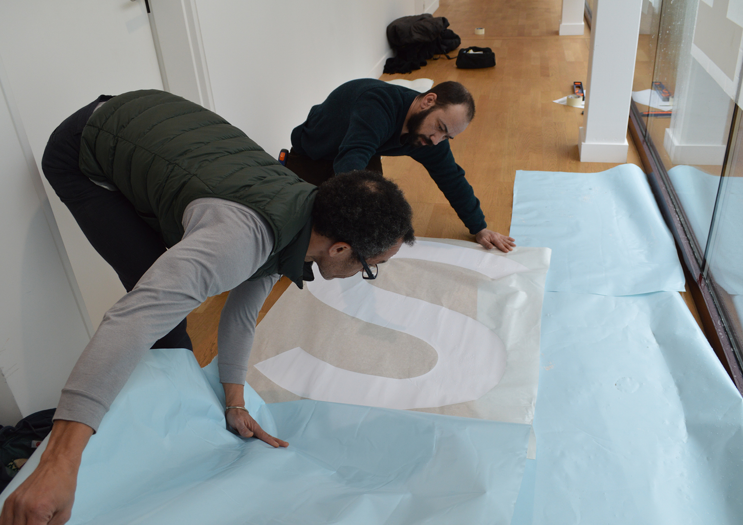 Adhesive letters on a table.