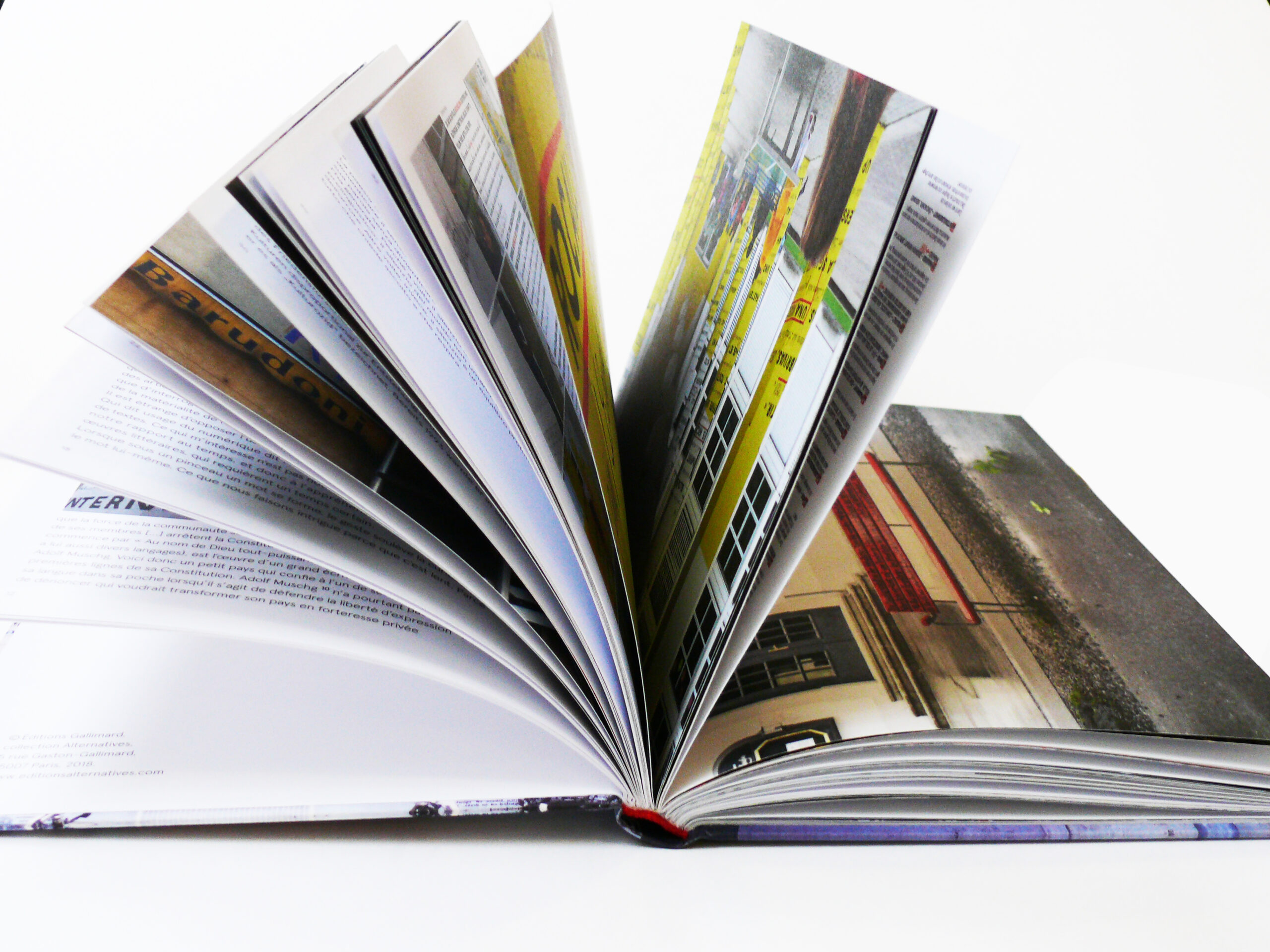 Book open in a fan shape.