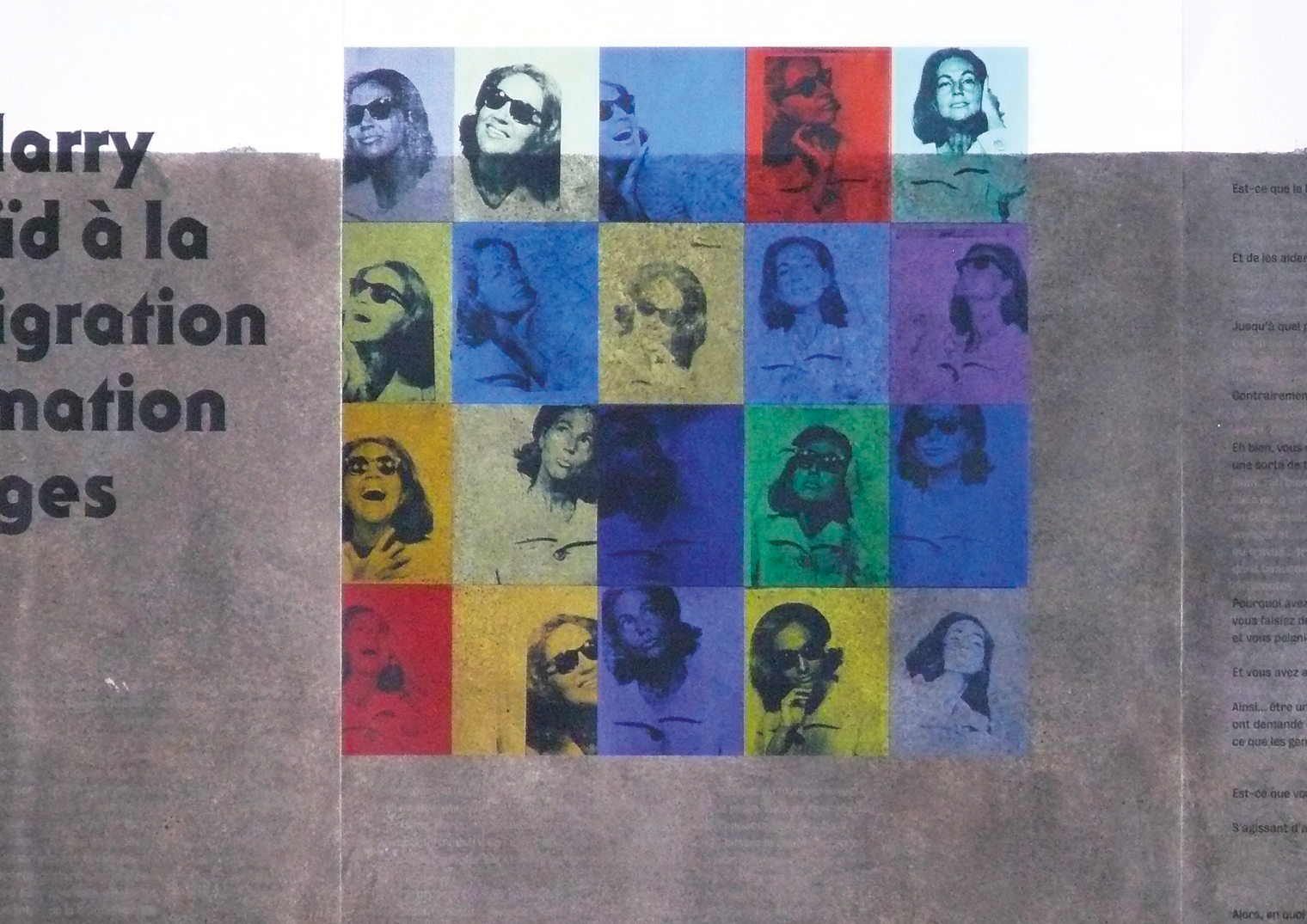 Coloured portraits on a wall.