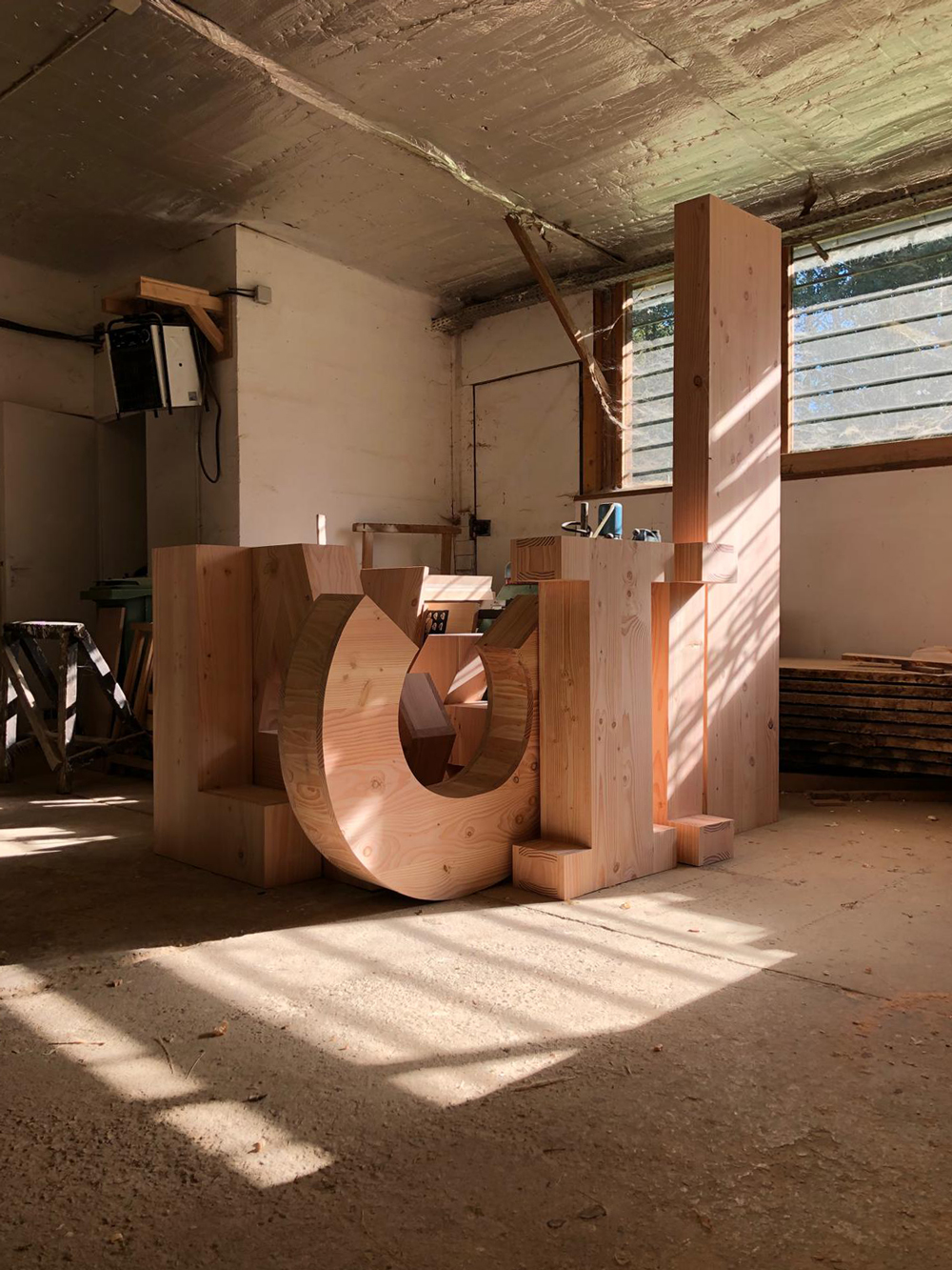 Three-dimensional letter components.